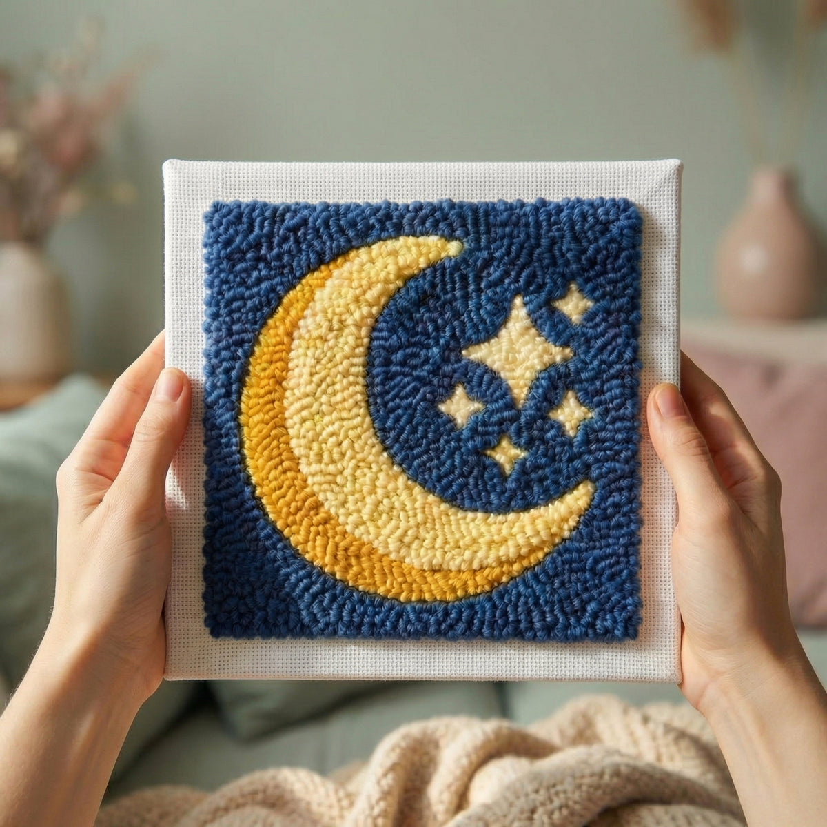 Finished Harmonie de Minuit punch needle artwork styled in a home interior.