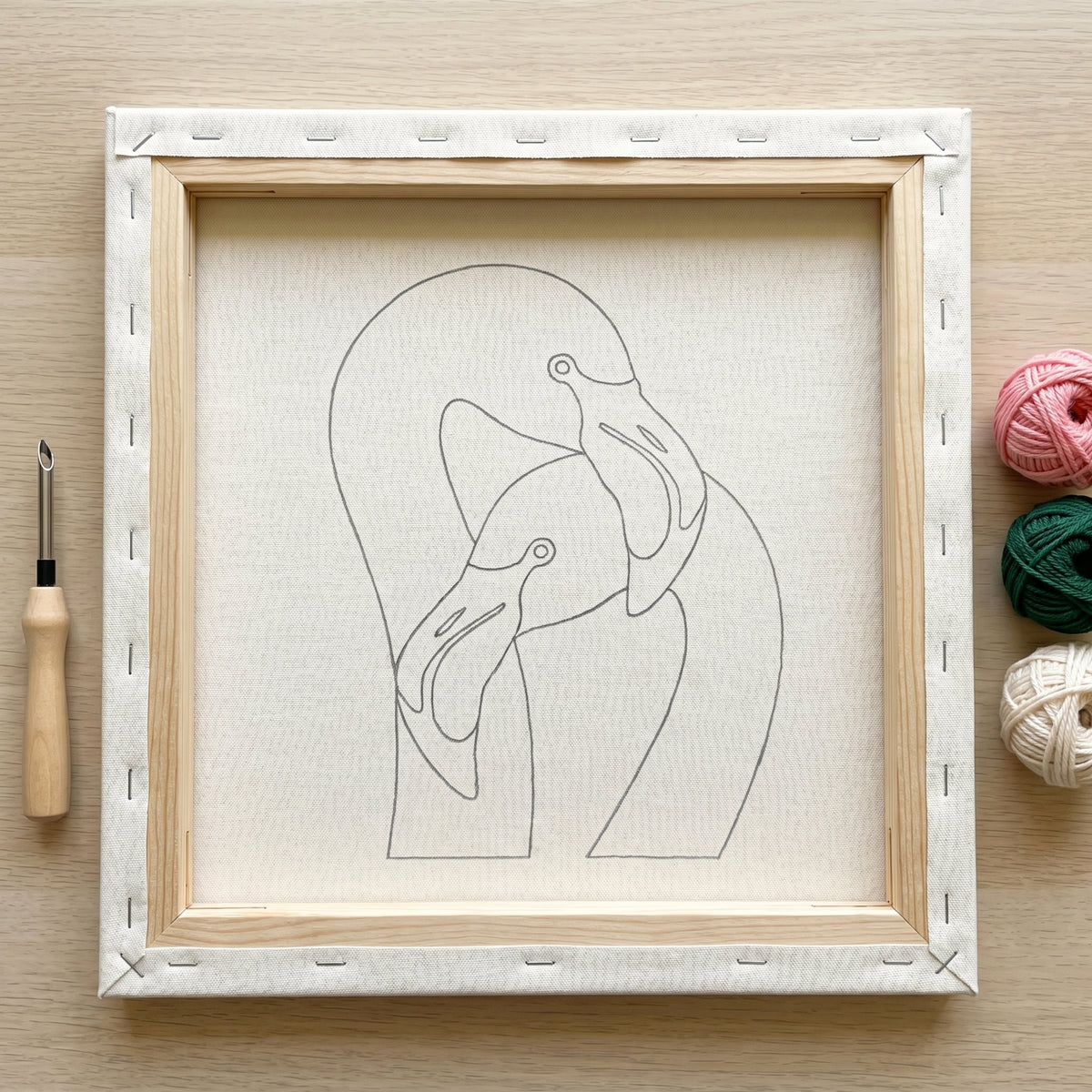 Blank pre-stretched canvas with the Duo de Flamants Roses pattern pre-printed, ready for punch needle embroidery.