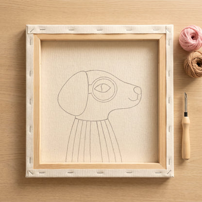 Blank pre-stretched canvas with the Rafael le Chien Éclaireur pattern pre-printed, ready for punch needle embroidery.