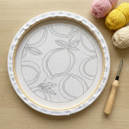 Finished Fraîcheur de Citrons punch needle artwork styled in a home interior.