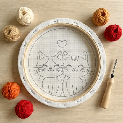 Blank pre-stretched canvas with the Couple de Chats Adorables pattern pre-printed, ready for punch needle embroidery.