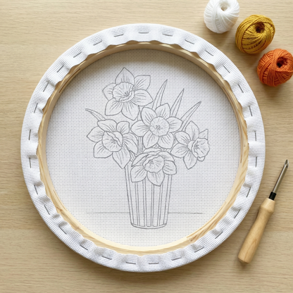 Blank pre-stretched canvas with the Narcisses Dorés pattern pre-printed, ready for punch needle embroidery.
