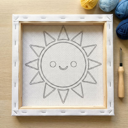 Punch needle kit contents - Pre-stretched canvas, yarn, needle and step-by-step instructions.