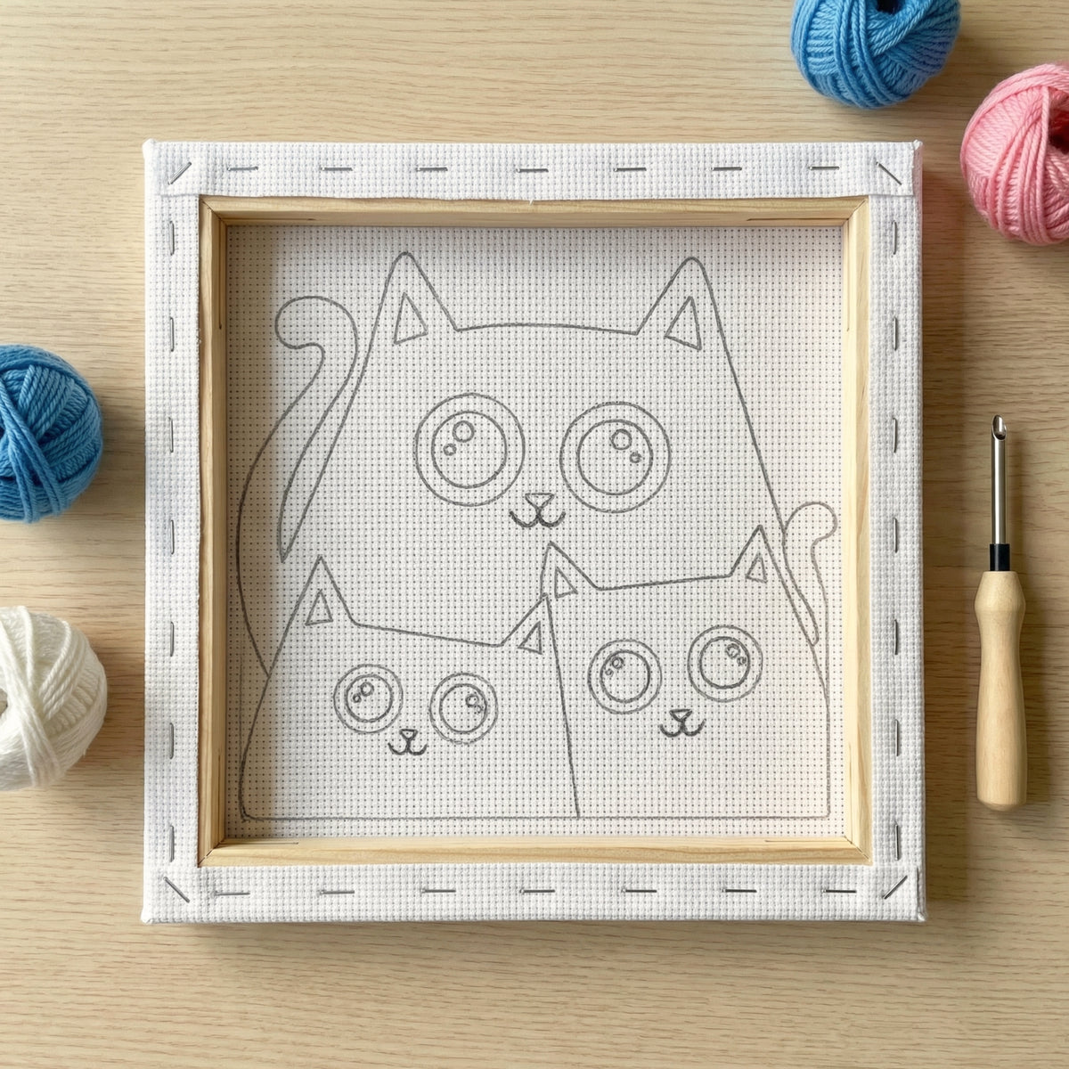 Finished Catflix punch needle artwork styled in a home interior.