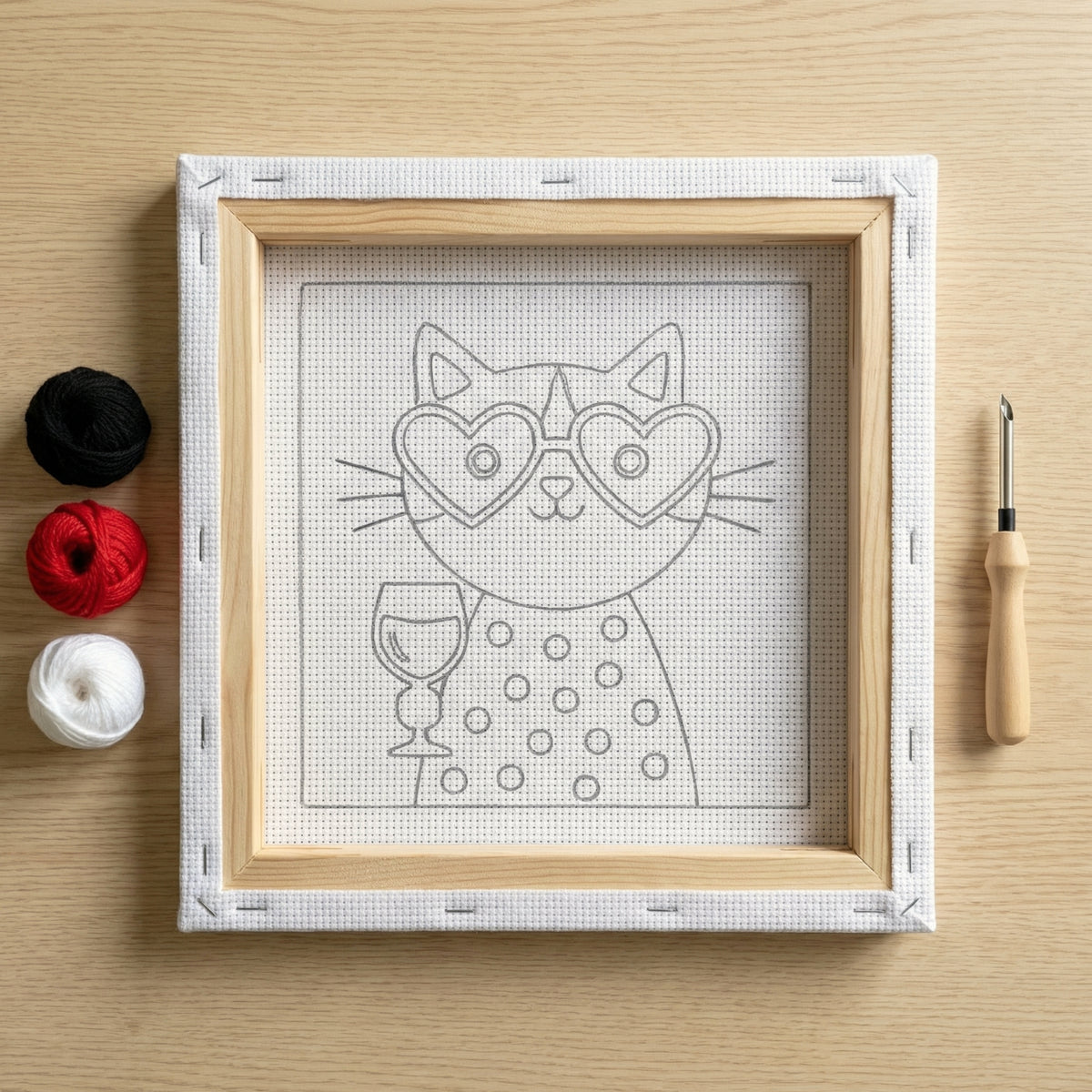 Blank pre-stretched canvas with the Raya la Chatte pattern pre-printed, ready for punch needle embroidery.