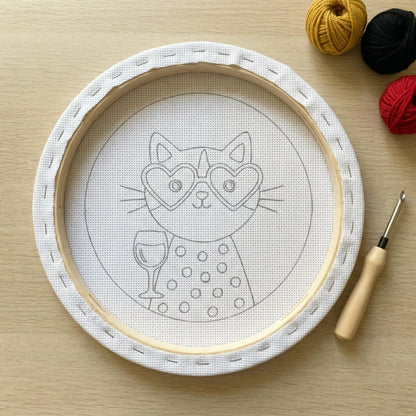 Punch needle kit contents - Pre-stretched canvas, yarn, needle and step-by-step instructions.