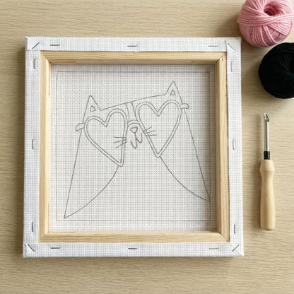 Punch needle kit contents - Pre-stretched canvas, yarn, needle and step-by-step instructions.