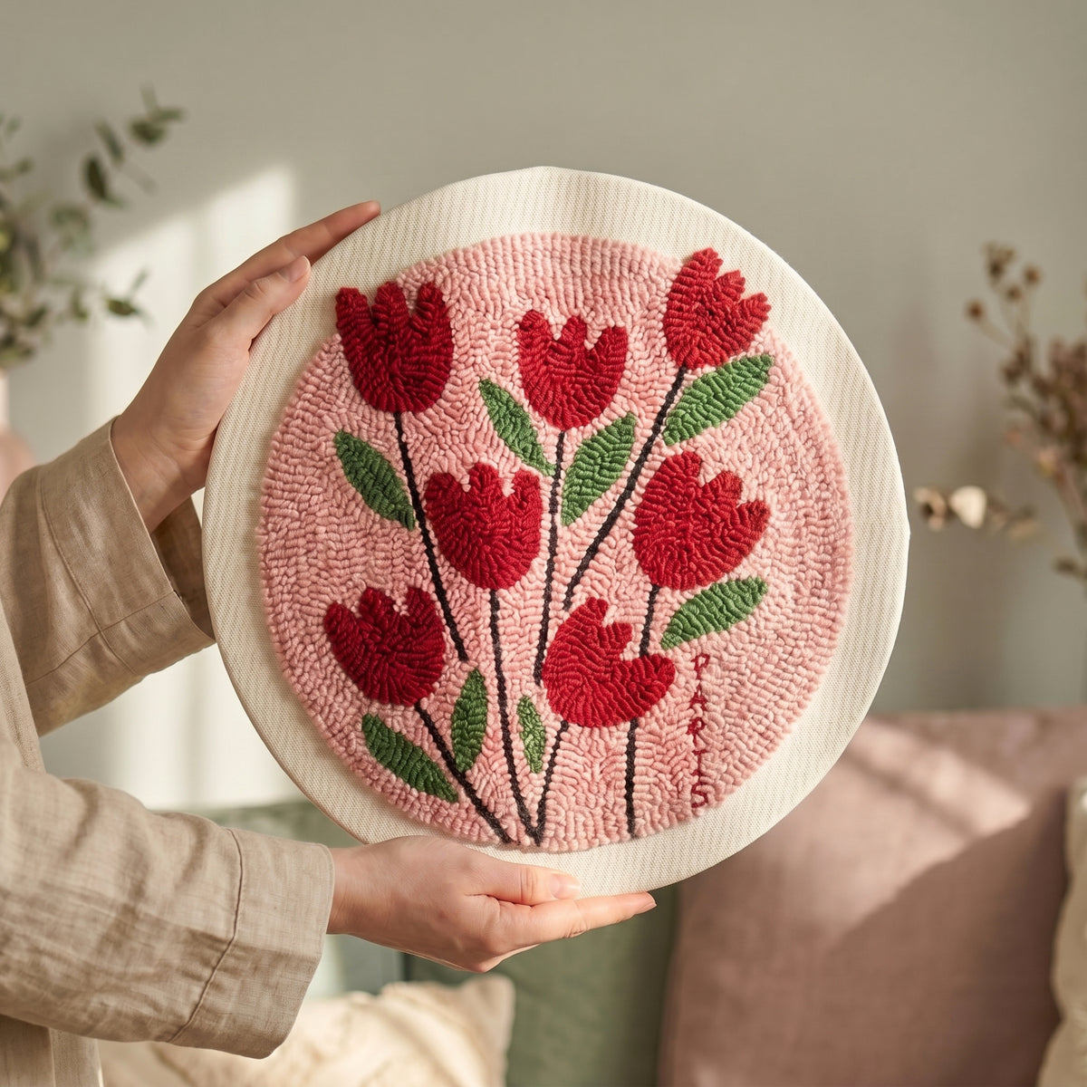 Finished Bouquet de Printemps punch needle artwork styled in a home interior.