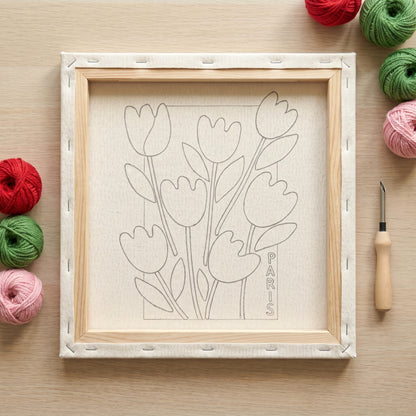 Finished Bouquet de Printemps punch needle artwork styled in a home interior.