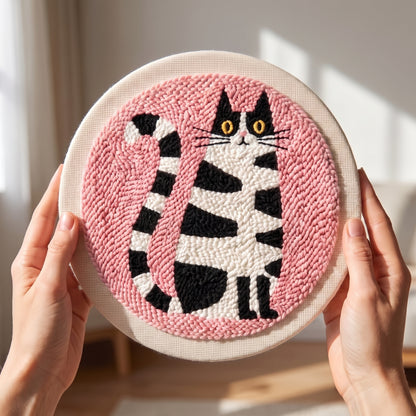Punch needle kit contents - Pre-stretched canvas, yarn, needle and step-by-step instructions.